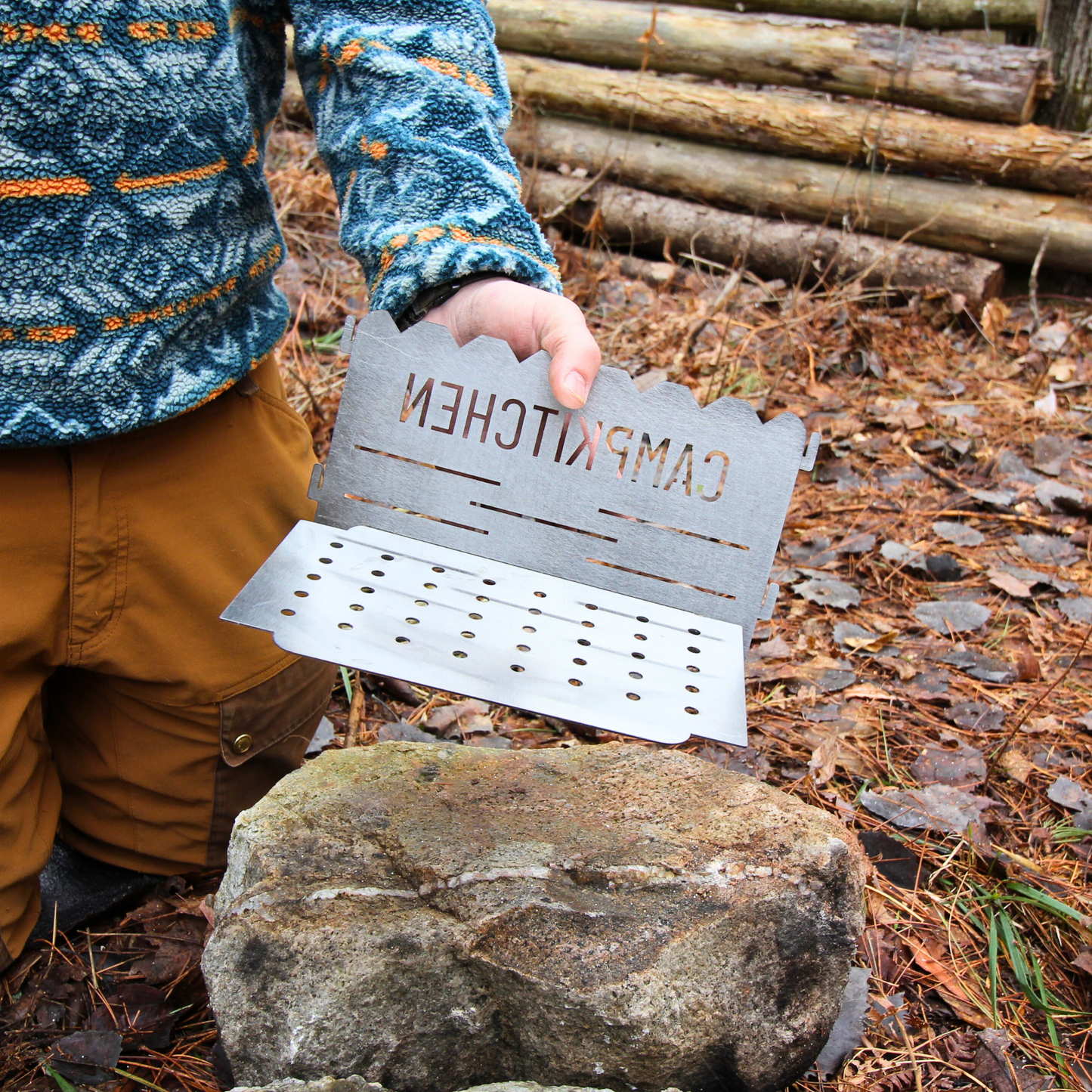 CAMPKITCHEN Twig Stove panels. Showcasing how the side and base panel slide together.